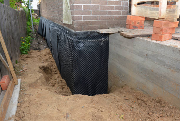 SJ Waterproofing Pros technician performing targeted Vapor Barrier Installation assessment in Kokomo, IN